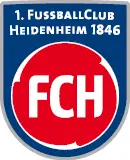 Wappen des 1. FC Heidenheim 1846 mit FCH Schriftzug auf rotem Grund in blauem Schild